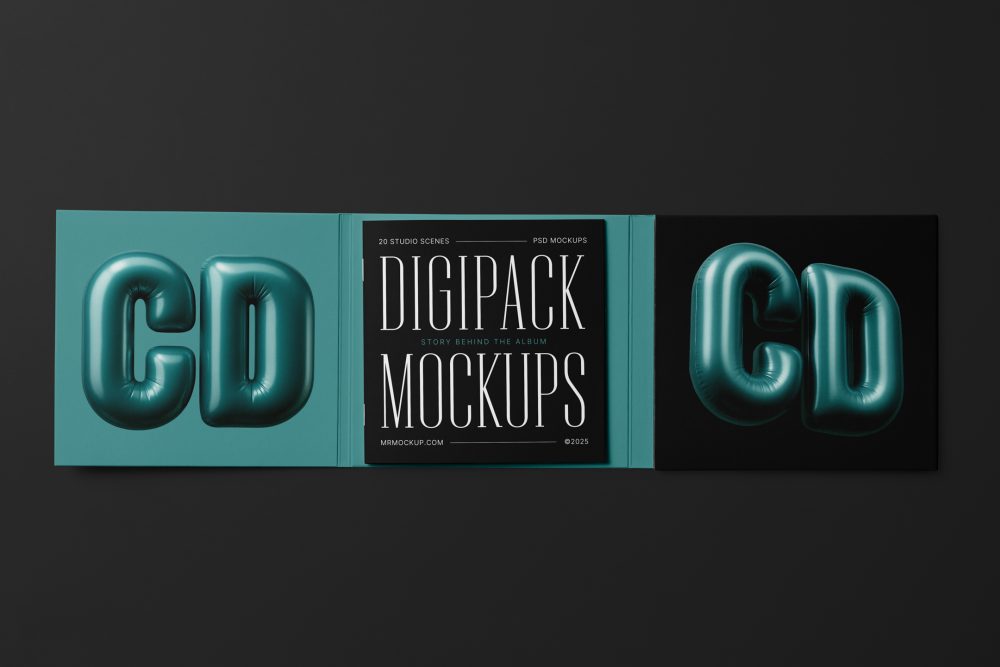 Viewed from above, CD Digipack Mockups presents green and black disc packaging with nice white serif typography and 3D graphics lying on the black background.