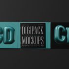 Viewed from above, CD Digipack Mockups presents green and black disc packaging with nice white serif typography and 3D graphics lying on the black background.