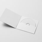 Viewed from above, CD Digipack Mockups presents an open white disc package and a white ejected disc lying on the gray background.