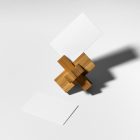 Front view, stationery mockups of two white business card mockups with a wooden toy lying on the white background.