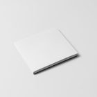 Viewed from above, CD Digipack Mockups presents a white disc package lying on the white background.