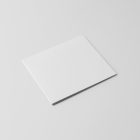 Viewed from above, CD Digipack Mockups presents a white disc package lying on the white background.