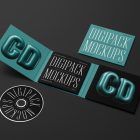 View from above, composition of CD Digipack Mockups presents what is inside the package in green, white, and black colors with nice serif typography and 3D graphics lying on the black background.