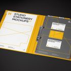 Front view, stationery mockups. Open yellow binder mockup with an A4 card mockup and three business card mockups lying on it, strong geometric typography design in yellow, black, and white colors. Everything is lying on a black background.