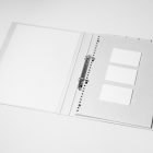 Front view, stationery mockups. Open white binder mockup with a white A4 card mockup and three white business card mockups lying on it. Everything is lying on a white background.