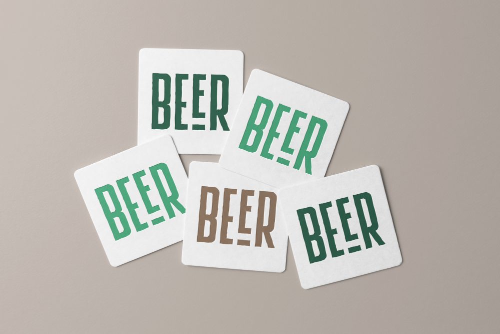 Viewed from above, five beer pad mockups in white color and condensed logo in two green shades and brown color lying on the beige background.