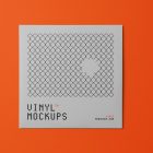 Viewed from above, Vinyl Mockups presents a square music album cover in a gray color with a metal fence graphic lying on an orange background.