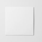 Viewed from above, Vinyl Mockups presents a white square music album cover lying on a white background.