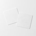 Viewed from above, two white beer pad mockups lying on the white background.