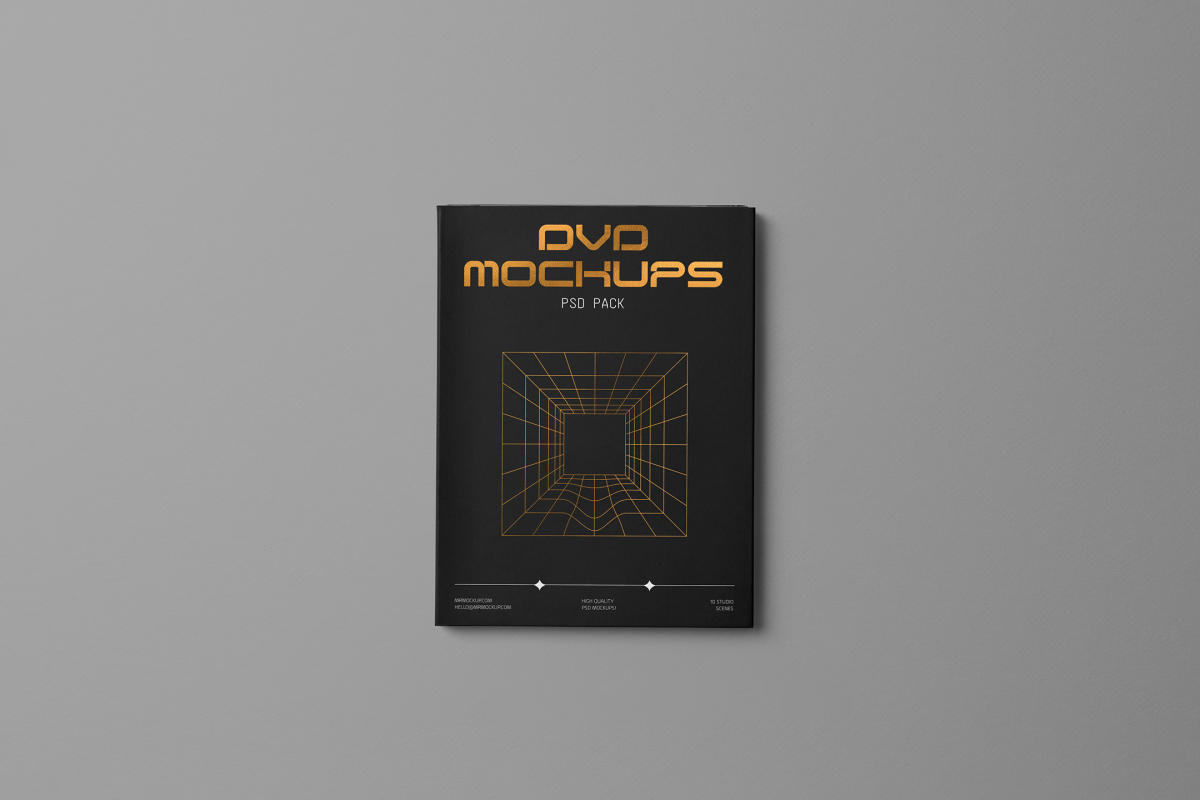 Viewed from above, DVD Mockups presents a black paper box with gold typography and linear graphics lying on the gray background.