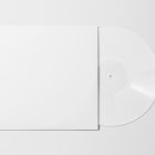 Viewed from above, Vinyl Mockups presents a white square music album cover and a white ejected vinyl disc lying on a white background.