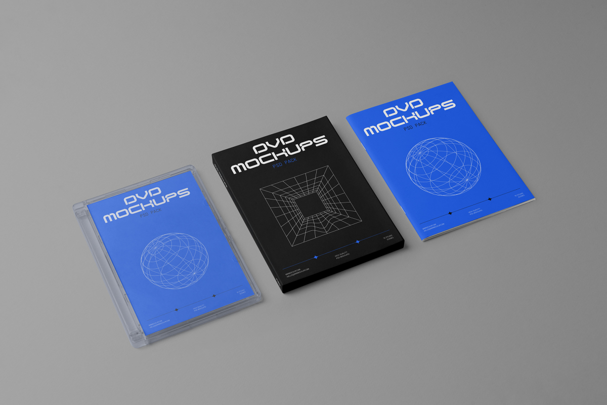 Viewed from above, DVD Mockups presents a transparent plastic package, a black paper box, and a blue booklet with white typography and linear graphics lying on the gray background.