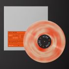 Viewed from above, Vinyl Mockups presents a square music album cover in a gray color with an orange label with a black frame and an ejected vinyl disc with pressed graphics in two colors lying on a black background.