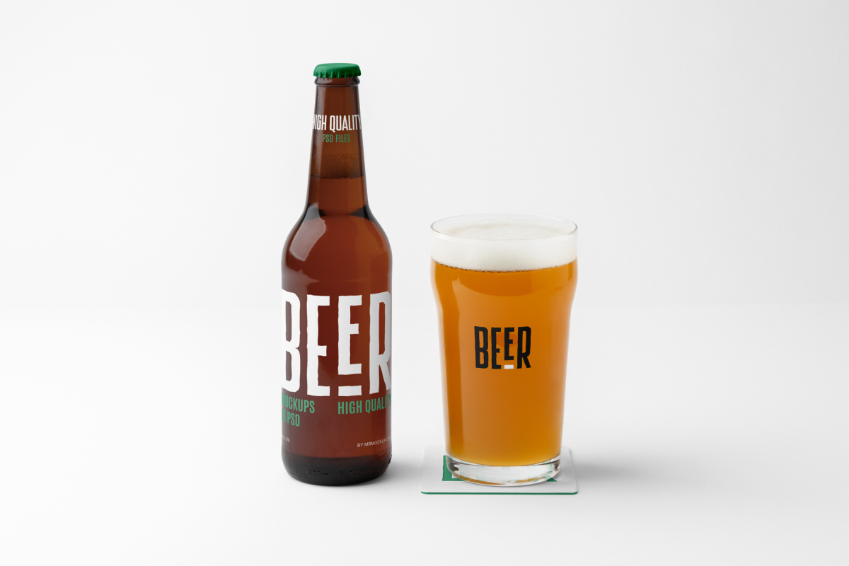 Front view of a standing beer bottle mockup with a white and green typography design, transparent beer glass mockup with black logo standing on the white floor.