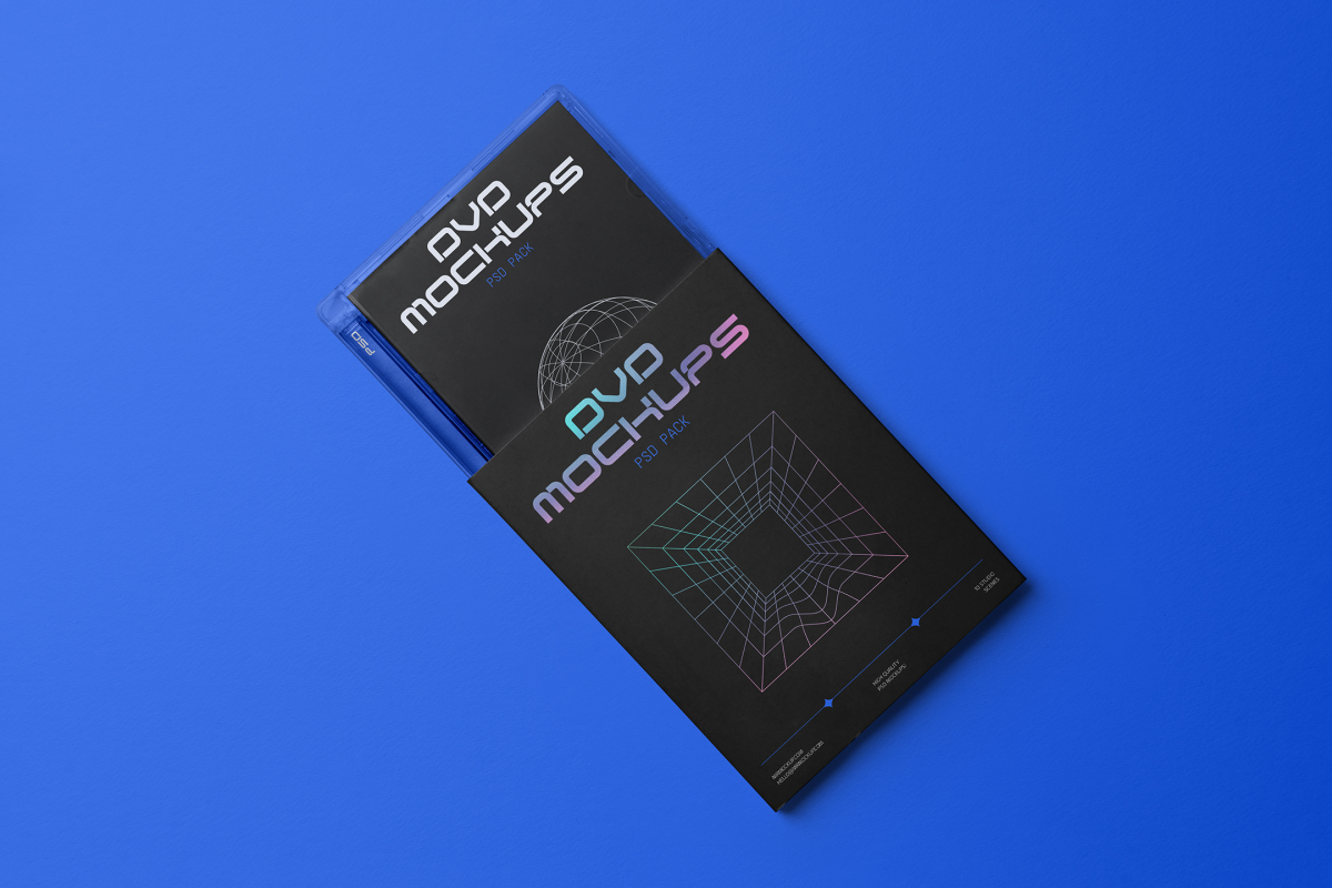 Viewed from above, DVD Mockups presents a black paper box with an ejected plastic DVD package, with white and holographic typography and linear graphics lying on the blue background.