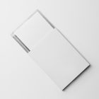 Viewed from above, DVD Mockups presents a white paper box with an ejected transparent plastic DVD package lying on the white background.