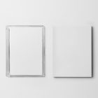 Viewed from above, DVD Mockups presents a white paper box lying next to a transparent plastic DVD package lying on the white background.