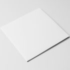 Viewed from above, Vinyl Mockups presents a white square music album cover lying on a white background.