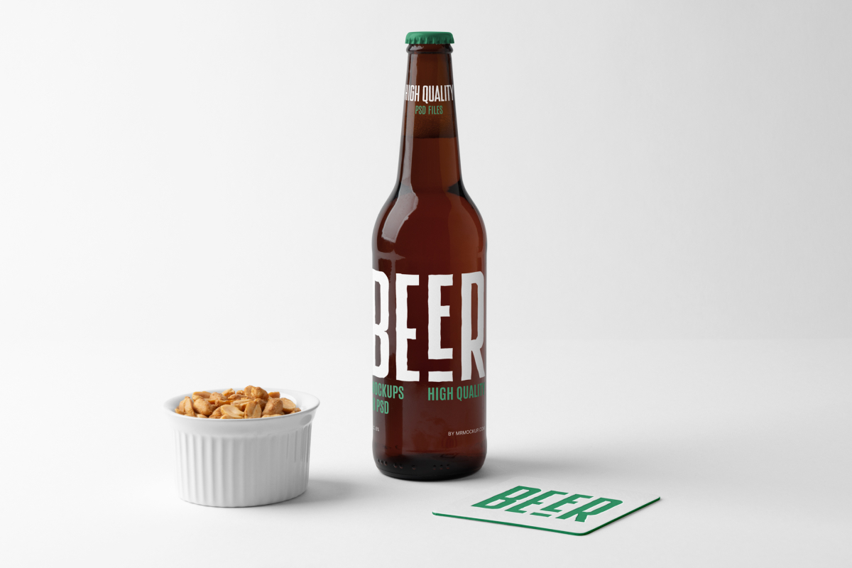 Front view of a standing beer bottle mockup with a white and green typography design, a white peanut container, and a white beer pad mockup with a big green logo standing on the white background floor.