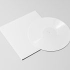 Viewed from above, Vinyl Mockups presents a white square music album cover and a white vinyl disc lying on a white background.