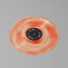 Viewed from above, Vinyl Mockups presents a vinyl disc with pressed graphics in two colors lying on the gray background.