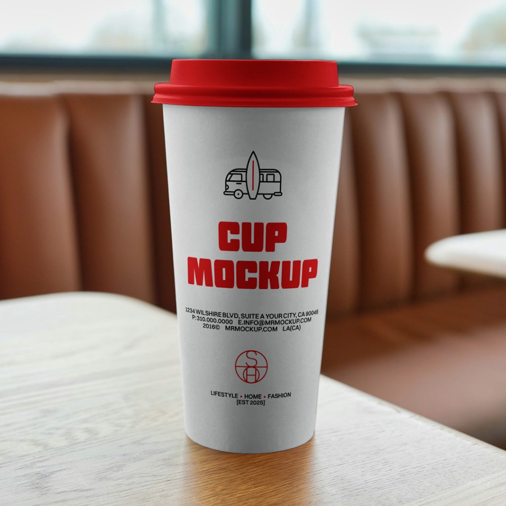 Front view, a white coffee cup mockup with a strong typography design standing on the wooden table.