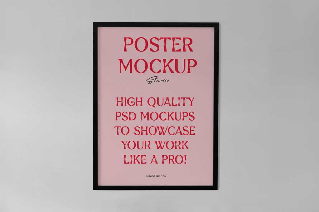 Front view, pink poster mockup with a black frame and red and black typography design hanging on the white wall.