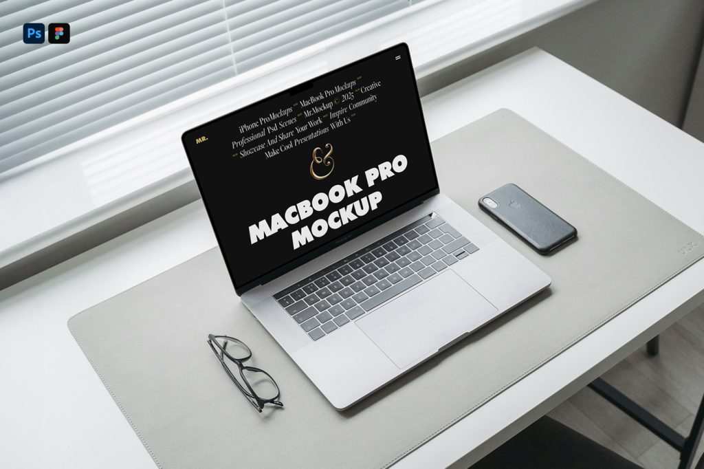 View from above, open silver MacBook Pro mockup with a black screen and professional website design lying on the modern white desk.
