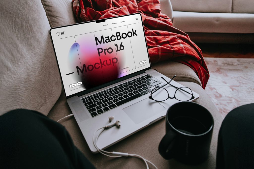 Free MacBook Pro Laying on Couch Mockup — Mr.Mockup