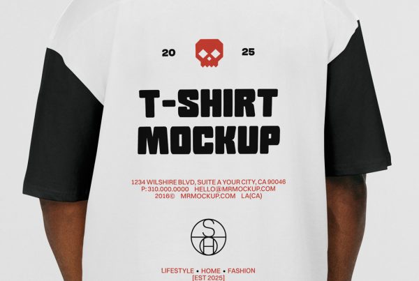 Men standing backwards wearing t-shirt mockups with red and black typography logo designs in front of the white wall.
