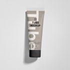 View from above, a Cosmetic Tube Mockups with delicate cosmetic design in black, cream, and beige colors, lying on a white colored background.