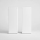 In the front view, two white vertical boxes from the Cosmetic Tube Mockups product stand next to each other on the white background.