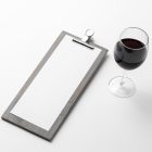 View from above, the scene from Studio Wine Mockups of a wooden menu and standing transparent wine glass, on the white background.