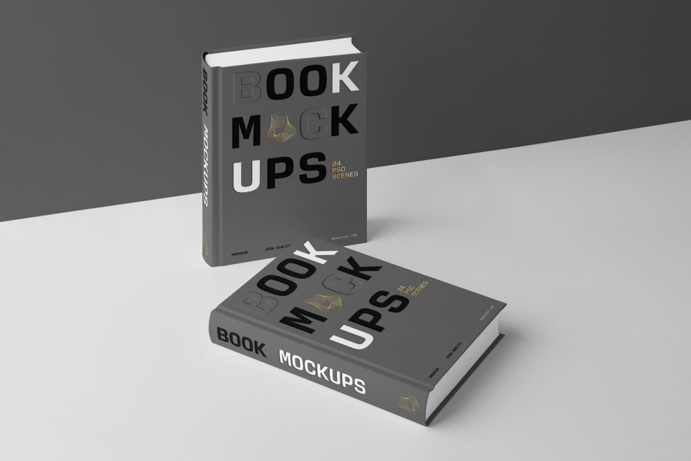 View from above, two hardcover book mockups with bold typography design in black, gold, gray, and white colors are located on the white background in perspective view.