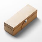 View from above, scene from Studio Wine Mockups of a closed wooden wine box lying on the white background.