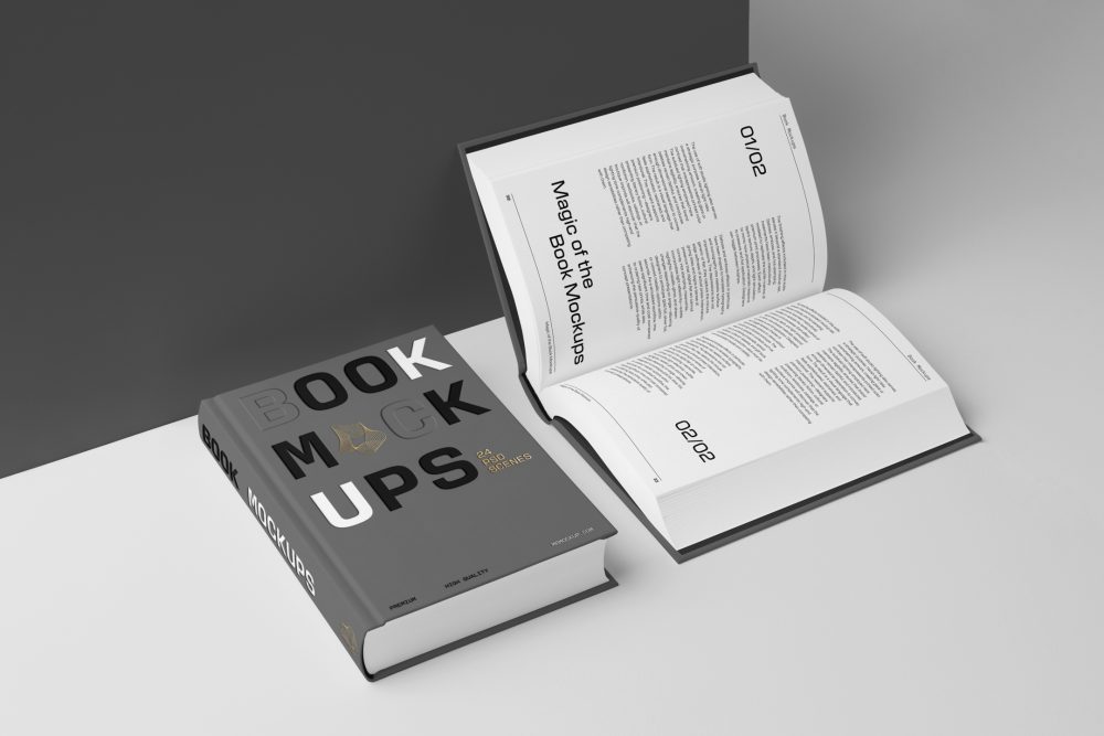 View from above, two hardcover book mockups with bold typography design in black, gold, gray, and white colors lying on the white background in perspective view.