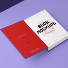 View from above, an open hardcover book mockup with bold typography design lying on the purple background in perspective view.