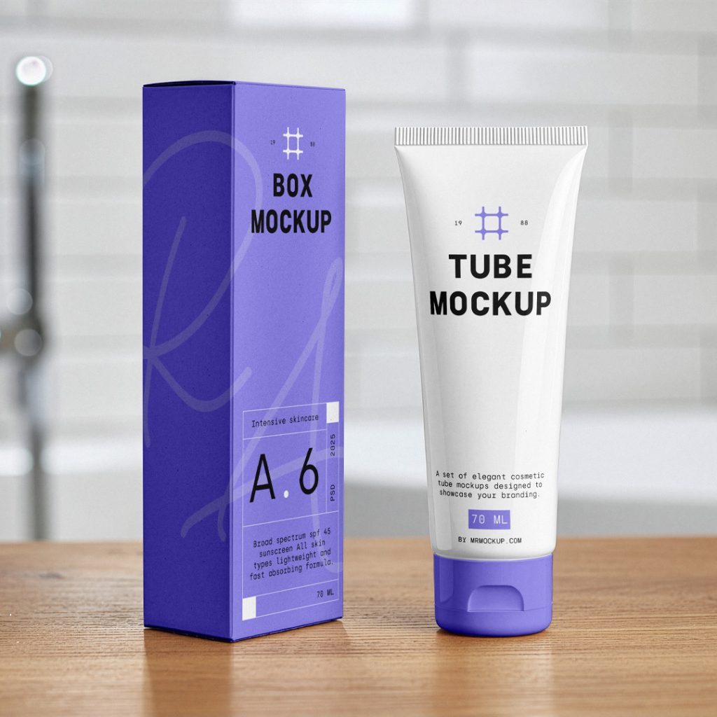 In the front view, a vertical Box Mockup and a Cosmetic Tube Mockup with delicate cosmetic designs in purple, white, and black colors stand next to each other in the background you can see a brightly lit bathroom.