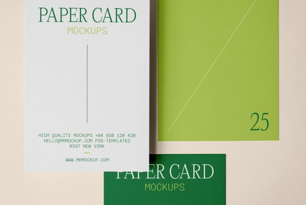 View from above, three a Paper Card Mockup in two sizes and a delicate typography design in green and lime colors are lying on the beige floor.