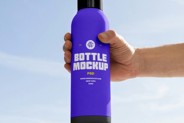 Men holding a purple bottle mockup with strong white typography design in hand in front of the blue sky.
