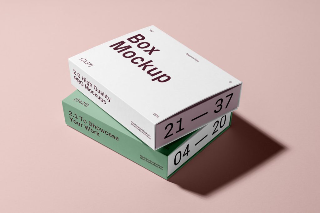 View of two box mockups in white and green colors and strong black and brown typography design lying on top of each other on the pink background.