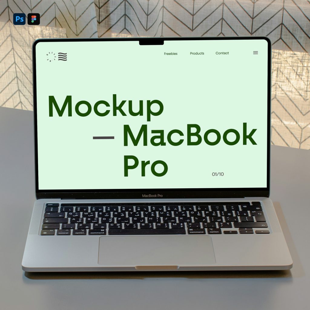 Front view, open silver MacBook Pro mockup laying on the grey table.