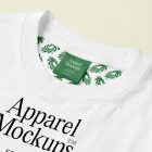 Lying white t-shirt mockup on a bright background with typography design in black and green color from studio apparel mockups product.