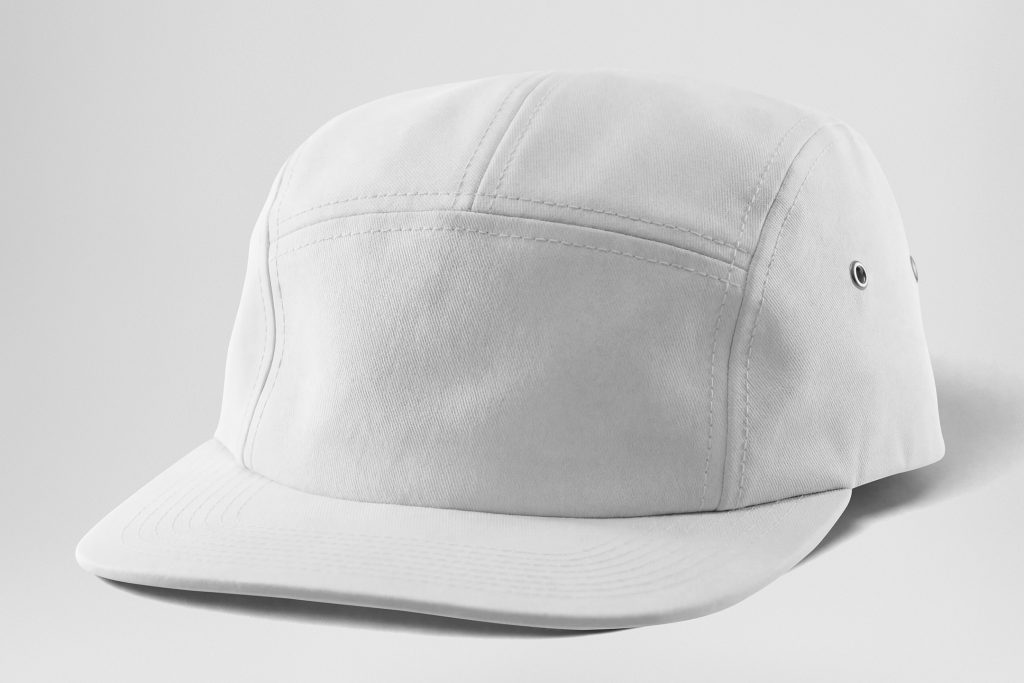 Front view, lying white five panel cap mockup on the white studio background from the studio apparel mockups product.