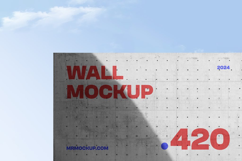 Front view a concrete wall mockup with red and blue typography design against the sky view.