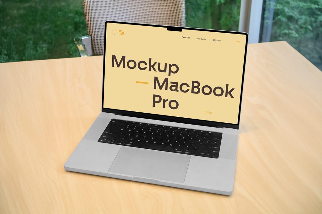 Front view MacBook Pro mockup with typography design on the screen standing on the wooden desk in the office.
