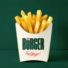 A white paper container filled with golden, crispy french fries, standing upright against a solid dark green background. The front of the container displays a green and red "BÜRGER" brand logo.