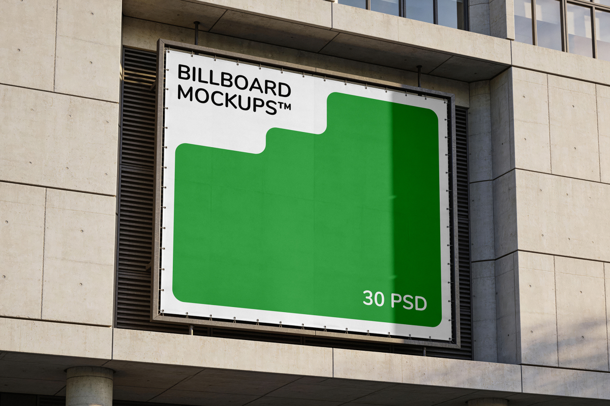 Square advertising banner mounted in a recessed frame on a modern concrete building facade.