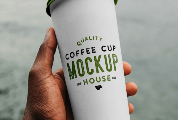 Free Coffee Cup By The River Mockup