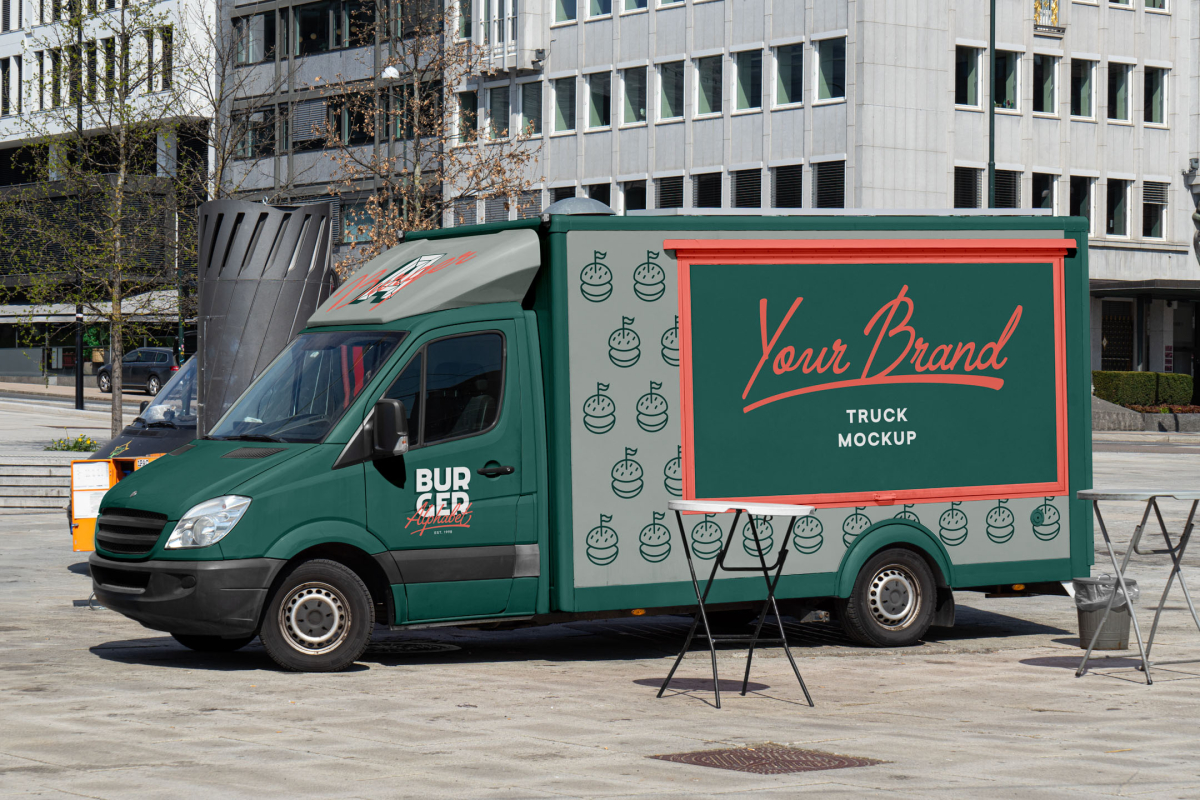 Side profile of a dark green Mercedes Sprinter food truck mockup with red framing and burger icons, parked in an open city plaza.